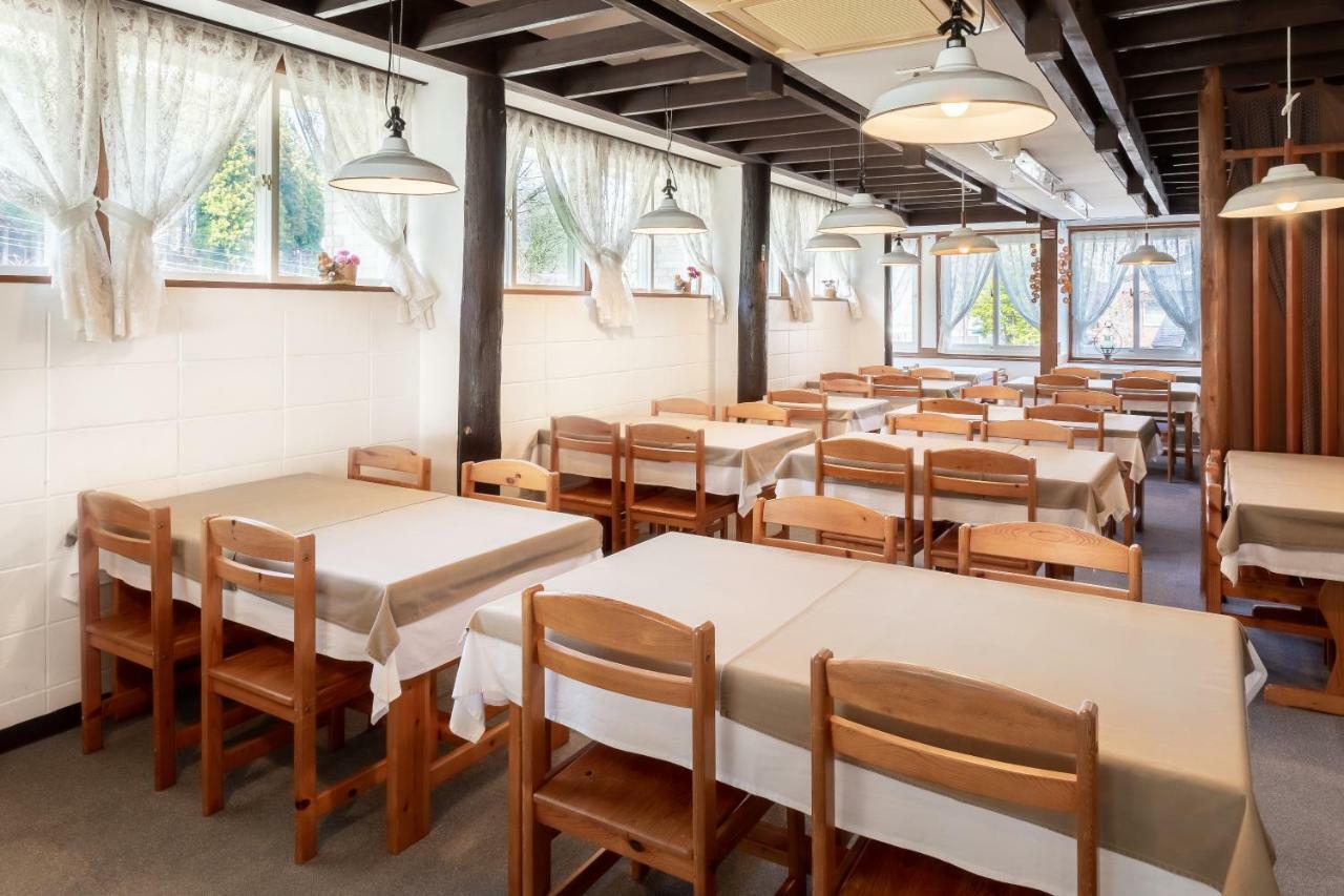 Community House Tyrolien Hotel Hakuba Exterior photo